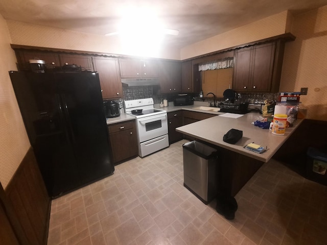 2504 N Clayton Ave, Springfield, MO 65803 - kitchen featuring white range with electric stovetop, black fridge with ice dispenser, wallpapered walls, under cabinet range hood, and a peninsula