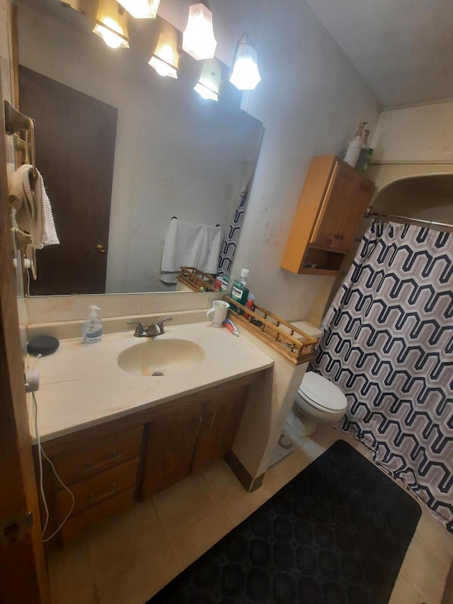 2504 N Clayton Ave, Springfield, MO 65803 - bathroom with toilet, vanity, tile patterned floors, and a shower with shower curtain