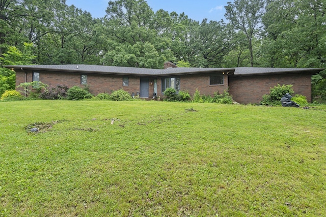 401 Honeysuckle Dr, Marshfield, MO 65706 - view of front of property with brick siding, a front lawn, and a chimney