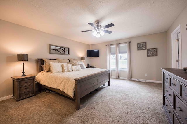 248 Charles Rd, Billings, MO 65610 - carpeted bedroom featuring baseboards, a textured ceiling, and ceiling fan