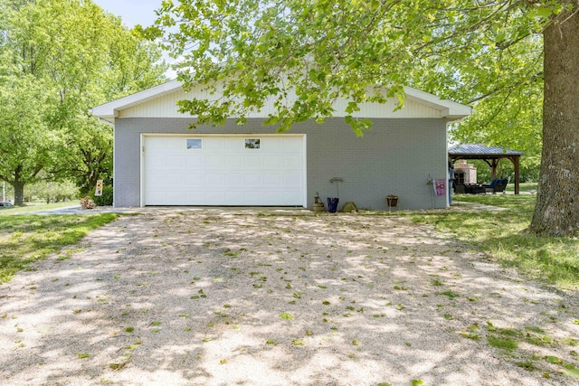 248 Charles Rd, Billings, MO 65610 - garage featuring dirt driveway