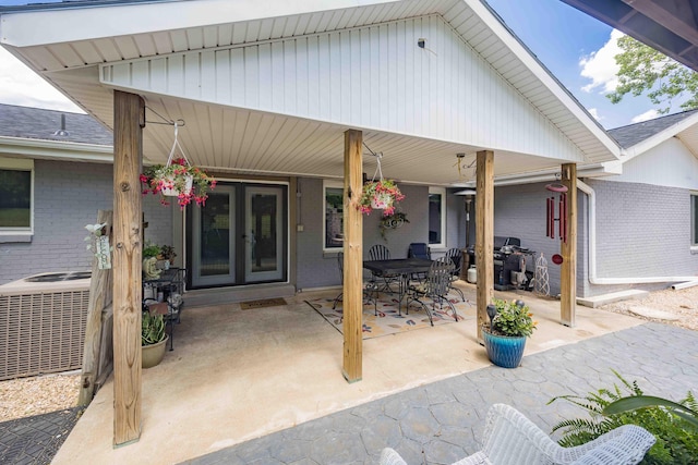 248 Charles Rd, Billings, MO 65610 - view of patio with french doors, grilling area, and outdoor dining area