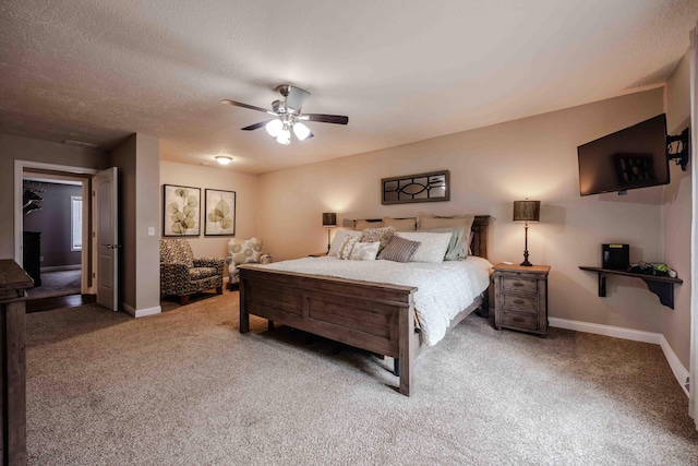 248 Charles Rd, Billings, MO 65610 - carpeted bedroom featuring baseboards, ceiling fan, and a textured ceiling