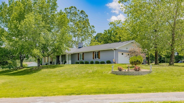 248 Charles Rd, Billings, MO 65610 - view of front of property with a garage, a front yard, and a chimney