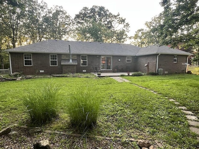 4120 S 119th Rd, Bolivar, MO 65613 - back of property featuring brick siding and a patio area