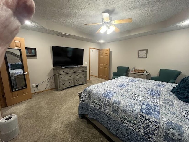4120 S 119th Rd, Bolivar, MO 65613 - bedroom featuring carpet flooring, a textured ceiling, ceiling fan, and a raised ceiling