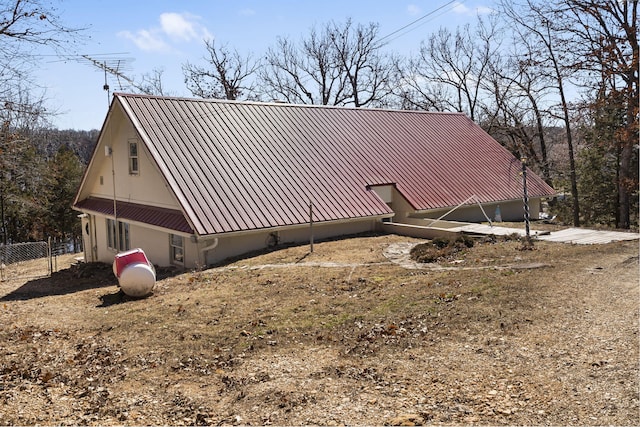 25451 County Road 327, Urbana, MO 65767 - view of home's exterior featuring metal roof