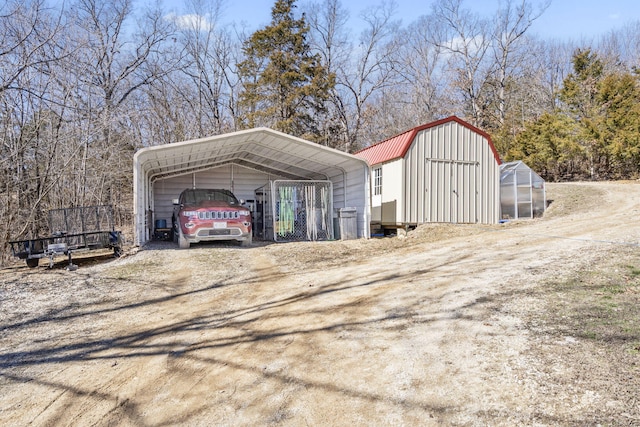 25451 County Road 327, Urbana, MO 65767 - view of greenhouse with dirt driveway and a detached carport