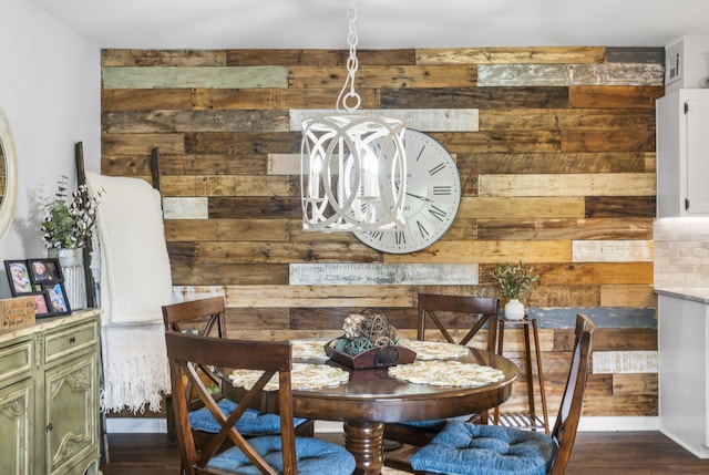 150 Sunken Forest Dr Unit 106, Forsyth, MO 65653 - dining room featuring wood walls and dark wood-type flooring