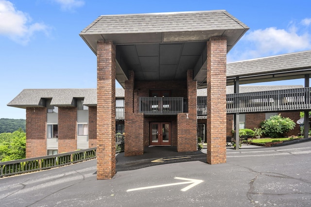 150 Sunken Forest Dr Unit 106, Forsyth, MO 65653 - doorway to property featuring french doors and brick siding