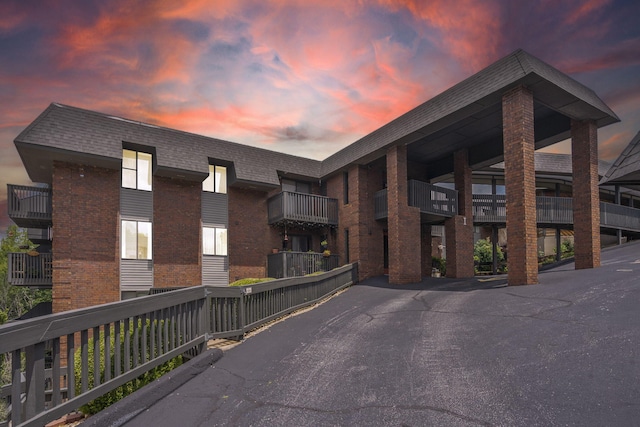150 Sunken Forest Dr Unit 106, Forsyth, MO 65653 - view of property at dusk