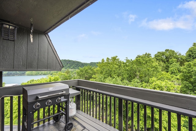 150 Sunken Forest Dr Unit 106, Forsyth, MO 65653 - balcony with grilling area and a wooded view