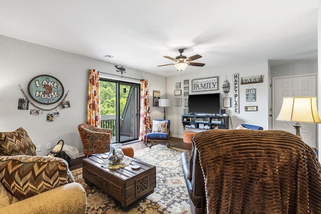 150 Sunken Forest Dr Unit 106, Forsyth, MO 65653 - living area with a ceiling fan, wood finished floors, and baseboards