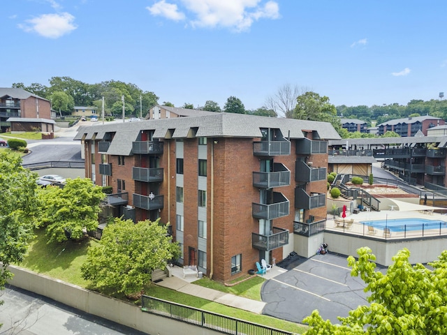 150 Sunken Forest Dr Unit 106, Forsyth, MO 65653 - view of building exterior with uncovered parking