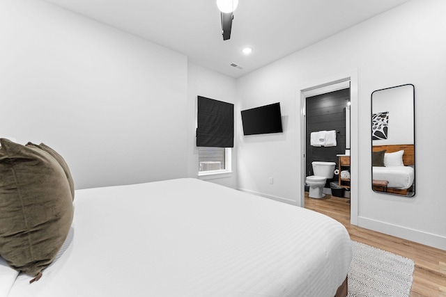 400 Poolside Pass, Hollister, MO 65672 - bedroom featuring light wood-style floors, ensuite bath, ceiling fan, and recessed lighting