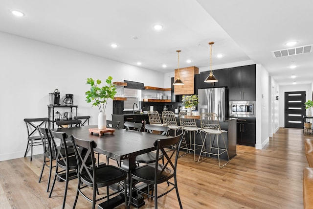 400 Poolside Pass, Hollister, MO 65672 - dining room with light wood-type flooring and recessed lighting