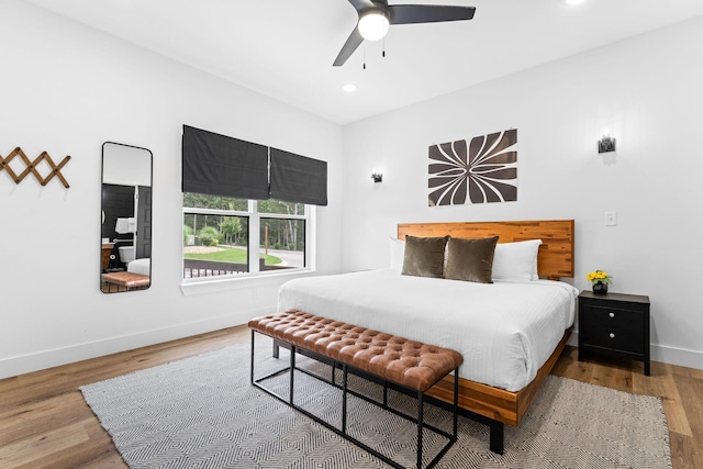 400 Poolside Pass, Hollister, MO 65672 - bedroom featuring wood finished floors, recessed lighting, and a ceiling fan