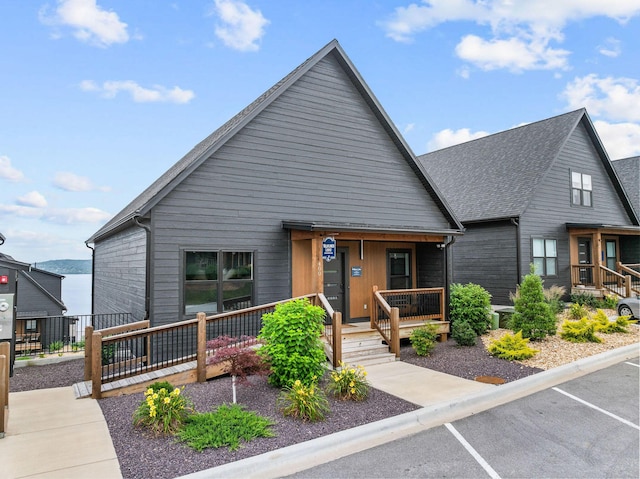 400 Poolside Pass, Hollister, MO 65672 - view of front of property with covered porch and uncovered parking