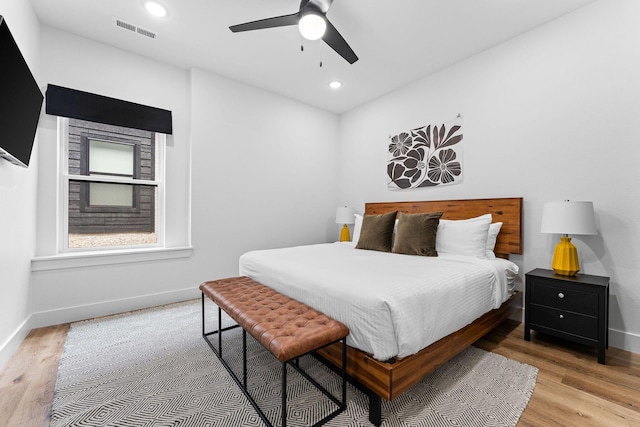 400 Poolside Pass, Hollister, MO 65672 - bedroom with light wood-style floors, recessed lighting, and ceiling fan