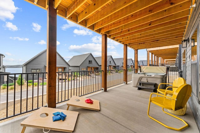 400 Poolside Pass, Hollister, MO 65672 - patio / terrace featuring a residential view and a water view