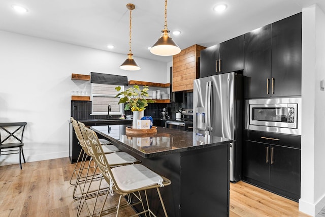 400 Poolside Pass, Hollister, MO 65672 - kitchen featuring open shelves, dark cabinetry, stainless steel appliances, backsplash, and recessed lighting