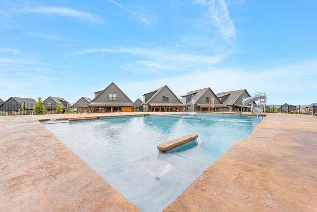 400 Poolside Pass, Hollister, MO 65672 - community pool with a water slide