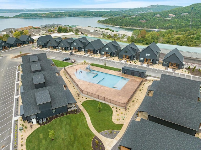400 Poolside Pass, Hollister, MO 65672 - aerial perspective of suburban area featuring a nearby body of water and a pool