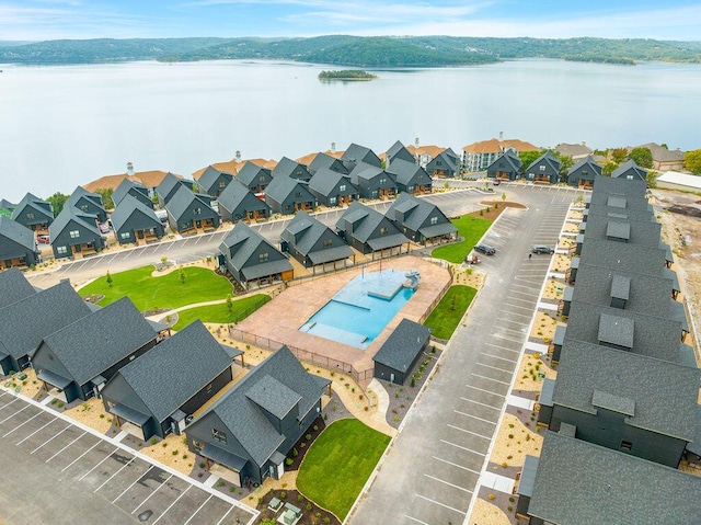400 Poolside Pass, Hollister, MO 65672 - aerial perspective of suburban area with a pool area and a nearby body of water