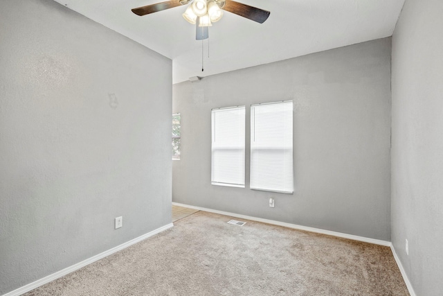 318 W Olive St, Aurora, MO 65605 - carpeted empty room featuring ceiling fan and baseboards