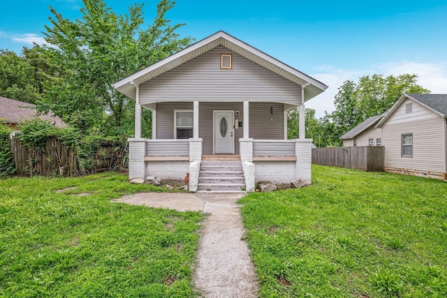 318 W Olive St, Aurora, MO 65605 - view of front of house featuring covered porch