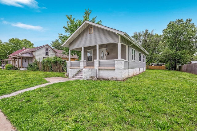 318 W Olive St, Aurora, MO 65605 - view of front of home featuring a porch