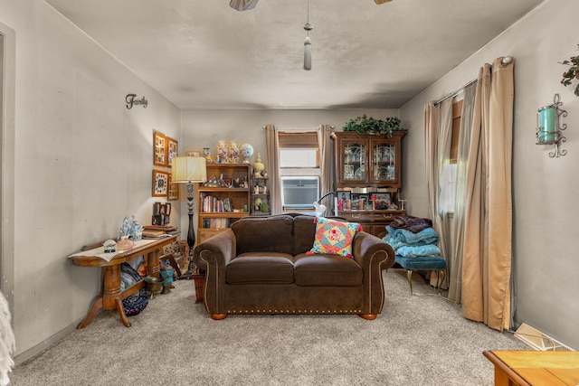 2140 N Crutcher Ave, Springfield, MO 65803 - living area featuring carpet floors, cooling unit, and baseboards