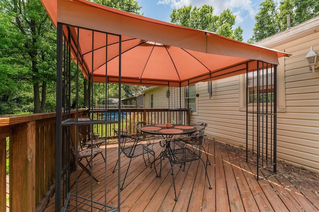 2140 N Crutcher Ave, Springfield, MO 65803 - deck with a gazebo and outdoor dining area