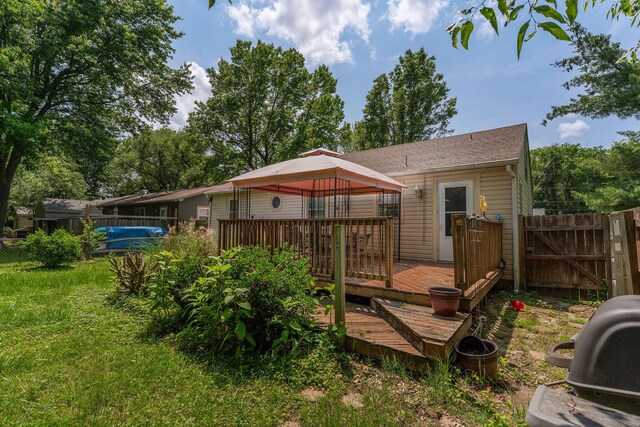 2140 N Crutcher Ave, Springfield, MO 65803 - rear view of house with a gazebo, a deck, and a gate