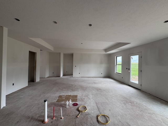 356 N Oak Ave, Sparta, MO 65753 - unfurnished room featuring a textured ceiling and a tray ceiling