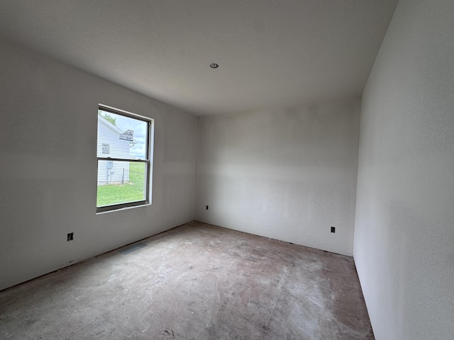 356 N Oak Ave, Sparta, MO 65753 - unfurnished room with concrete floors