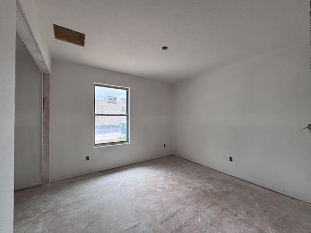 356 N Oak Ave, Sparta, MO 65753 - unfurnished bedroom featuring concrete flooring