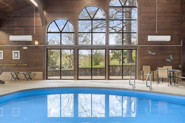 234 Sunset Cv Unit 107, Branson, MO 65616 - indoor pool featuring an AC wall unit