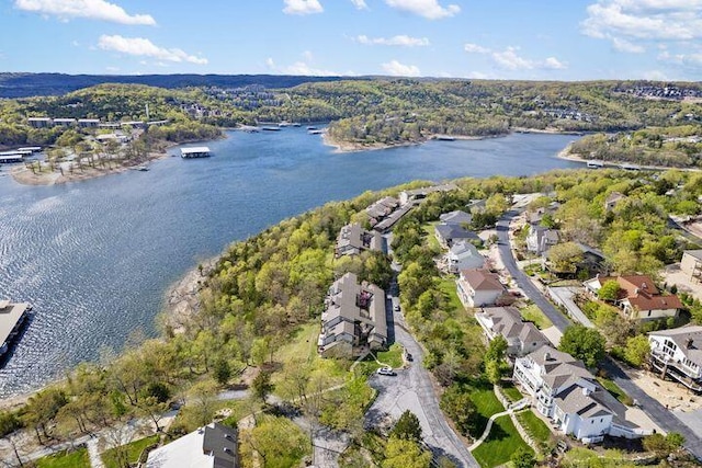 234 Sunset Cv Unit 107, Branson, MO 65616 - aerial view of property's location with a large body of water, nearby suburban area, and a forest