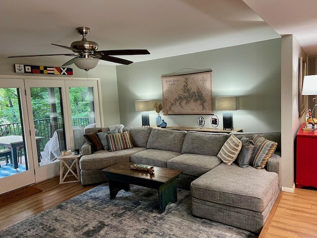 234 Sunset Cv Unit 107, Branson, MO 65616 - living area featuring ceiling fan and wood finished floors