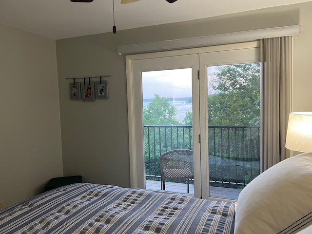 234 Sunset Cv Unit 107, Branson, MO 65616 - bedroom featuring access to outside and multiple windows