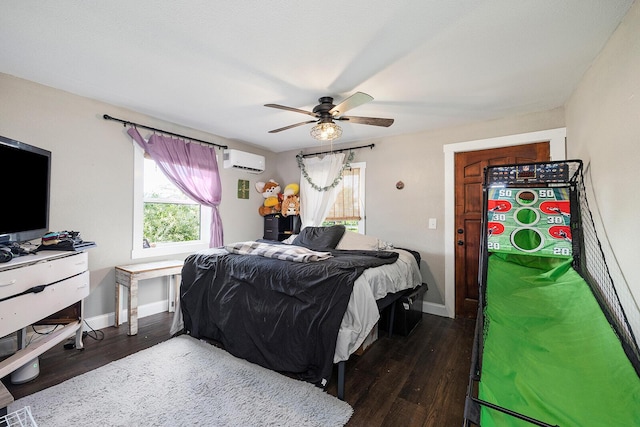 214 Rudolph St, Seymour, MO 65746 - bedroom featuring an AC wall unit, dark wood-style floors, baseboards, and ceiling fan