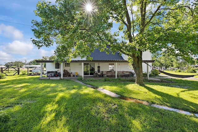 214 Rudolph St, Seymour, MO 65746 - rear view of property with a patio area and a lawn
