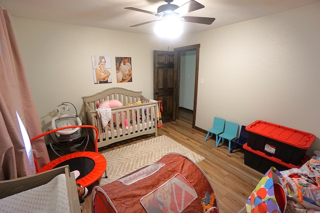 20770 State Highway 76, Cassville, MO 65625 - bedroom featuring wood finished floors and ceiling fan