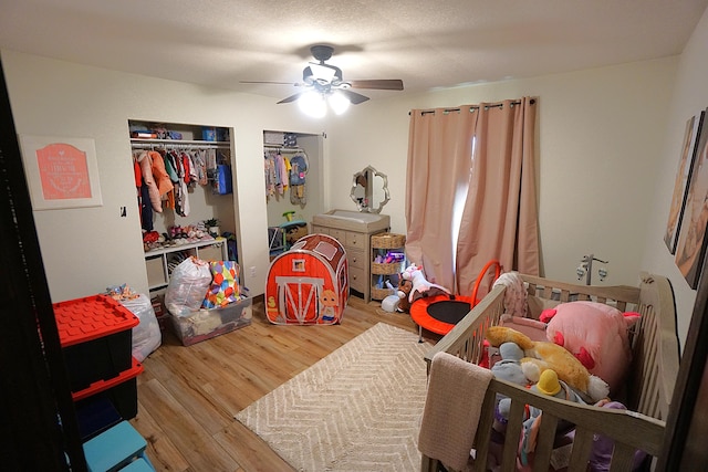 20770 State Highway 76, Cassville, MO 65625 - bedroom featuring wood finished floors and a ceiling fan