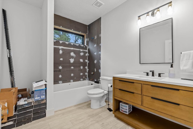 176 Shooting Star Ln, Nixa, MO 65714 - full bathroom with vanity, toilet, wood finished floors, and bathtub / shower combination