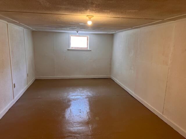 935 W Brower St, Springfield, MO 65802 - basement featuring baseboards