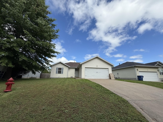 208 Justin St, Rogersville, MO 65742 - single story home featuring concrete driveway and an attached garage