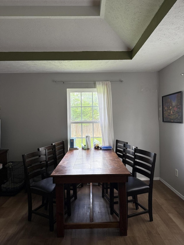 208 Justin St, Rogersville, MO 65742 - dining space featuring wood finished floors, a textured ceiling, and baseboards