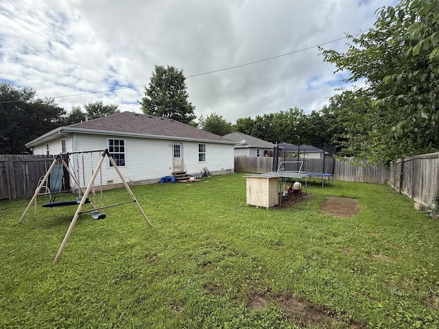 208 Justin St, Rogersville, MO 65742 - view of yard with a trampoline, entry steps, and a playground